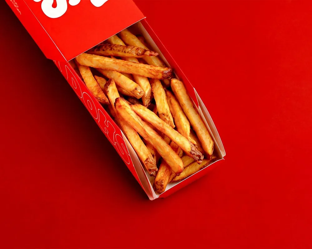 Dough Dohs Skin On Fries in a branded red box