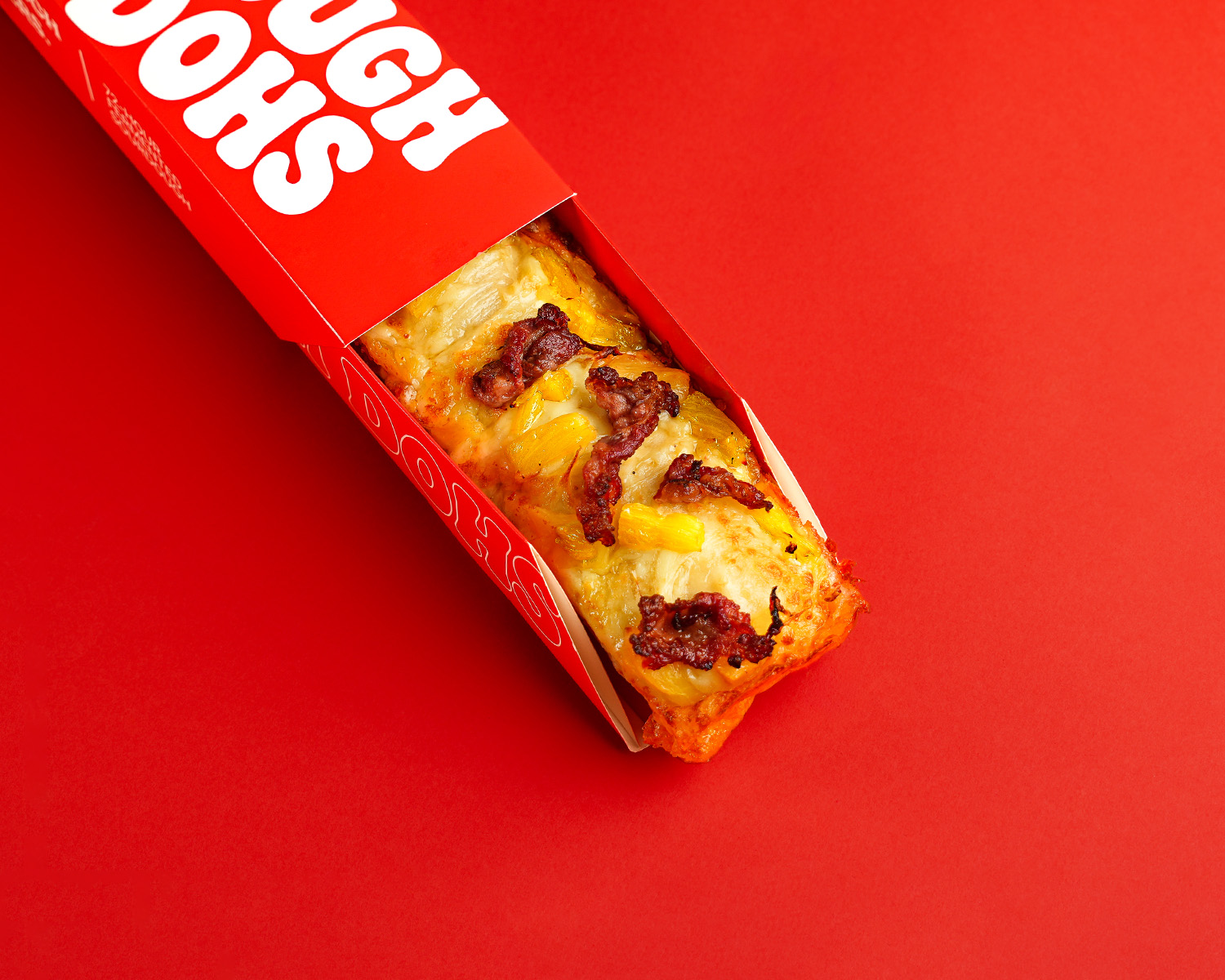 Dough Dohs Hawaiian pizza in its branded red box