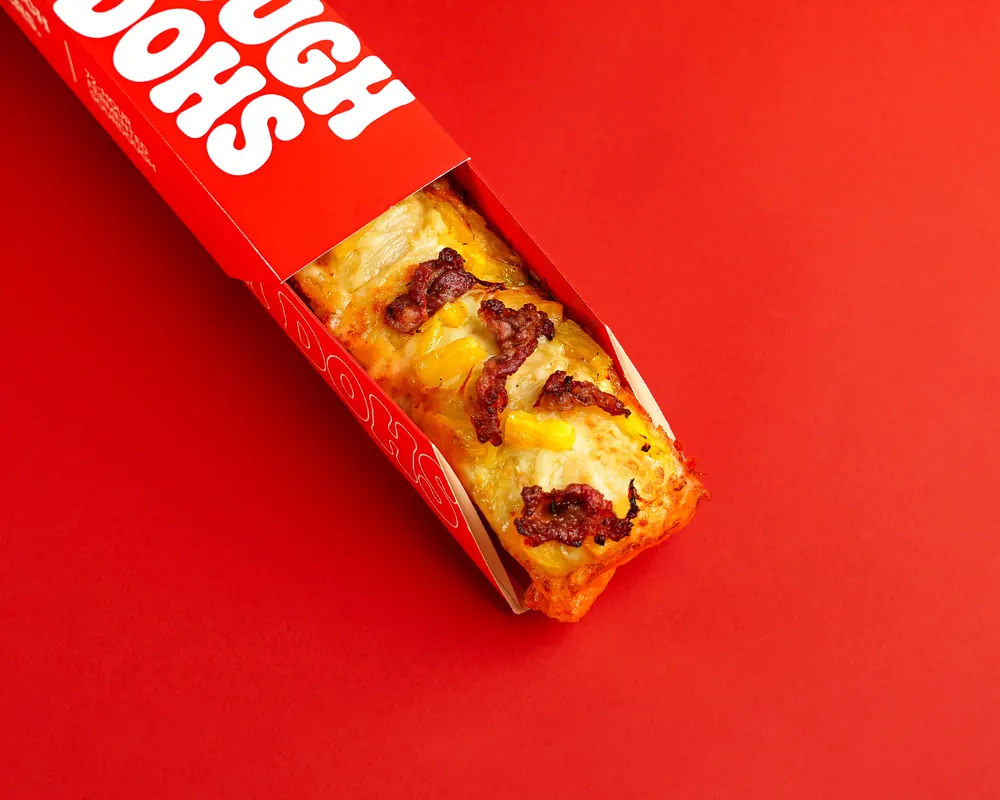 Dough Dohs Hawaiian pizza in its branded red box