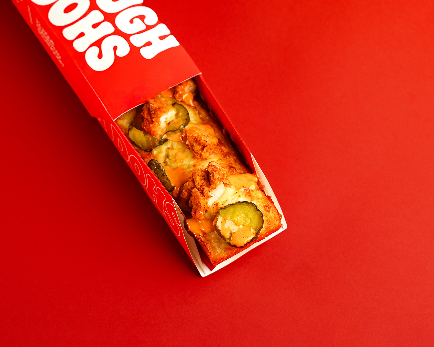 Dough Dohs Nashville pizza in its branded red box