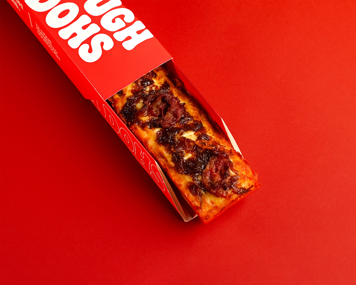Dough Dohs Smokestack pizza in its branded red box