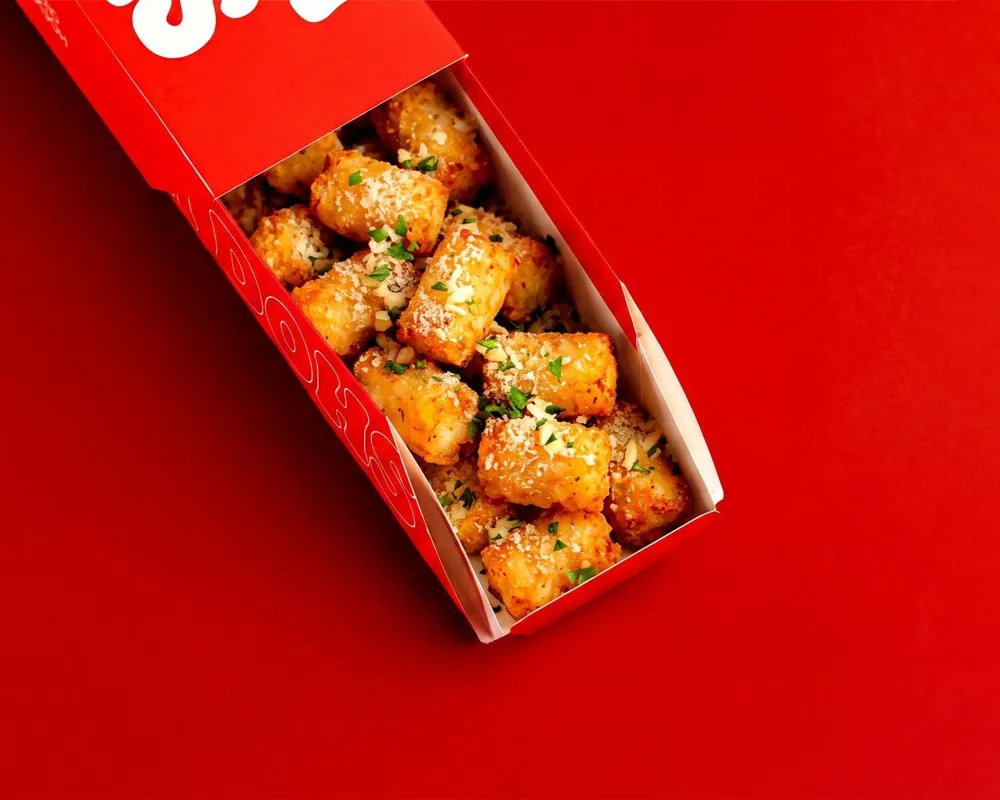 Dough Dohs Garlic Parmesan Tots in a branded red box